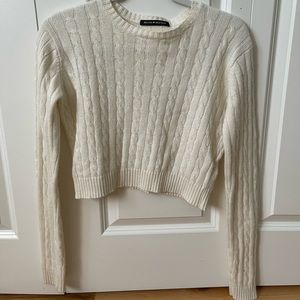 Cream cable knit long sleeve crop top. Brandy Melville. Never worn.